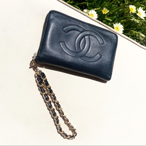CHANEL Handbags - CHANEL CC Caviar Large Zip Around Wristlet Clutch
